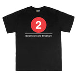 Classic Subway Tees | Black t-shirt with a blue circle featuring a white "2". Text below reads: "Downtown to Brooklyn." Perfect for fans of the NYC Subway Line.