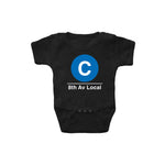 Baby Classic Subway Logo Romper | Black romper with a blue circle featuring a white "C". Text below reads: "8th Av Local." Perfect for fans of the NYC Subway Line.