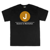 Classic Subway Tees | Black t-shirt with a blue circle featuring a white "J". Text below reads: "Queens to Manhattan." Perfect for fans of the NYC Subway Line.