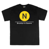 Classic Subway Tees | Black t-shirt with a blue circle featuring a white "N". Text below reads: "Brooklyn to Queens." Perfect for fans of the NYC Subway Line.