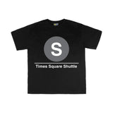 Toddler Classic Subway Logo Tee | Black t-shirt with a blue circle featuring a white  "S". Text below reads: "Times Square Shuttle." Perfect for fans of the NYC Subway Line.